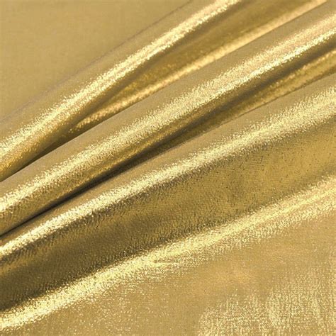 gold metallic dress fabric|metallic gold on cream fabric.